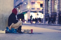 Homeless person begging on the street