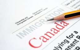 canadian immigration application document with pencil