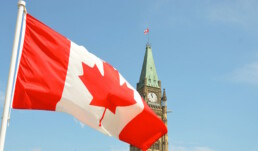 Canada flag in front of parliament